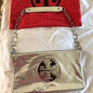 Silver Tory Burch Reva Clutch with duster bag